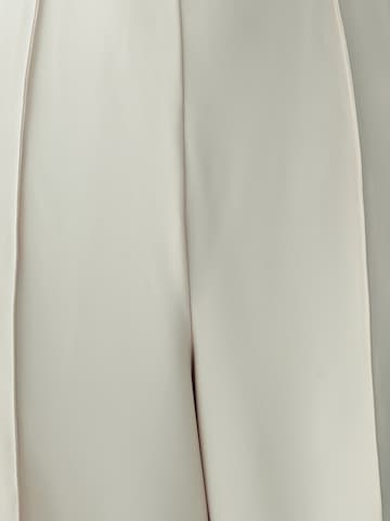 Willa Kezeslábas 'Justina' - bézs
