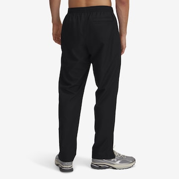UNDER ARMOUR Sporthose in Schwarz