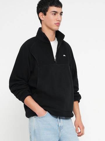 ELLESSE Urheiluneule 'Caponie' värissä musta