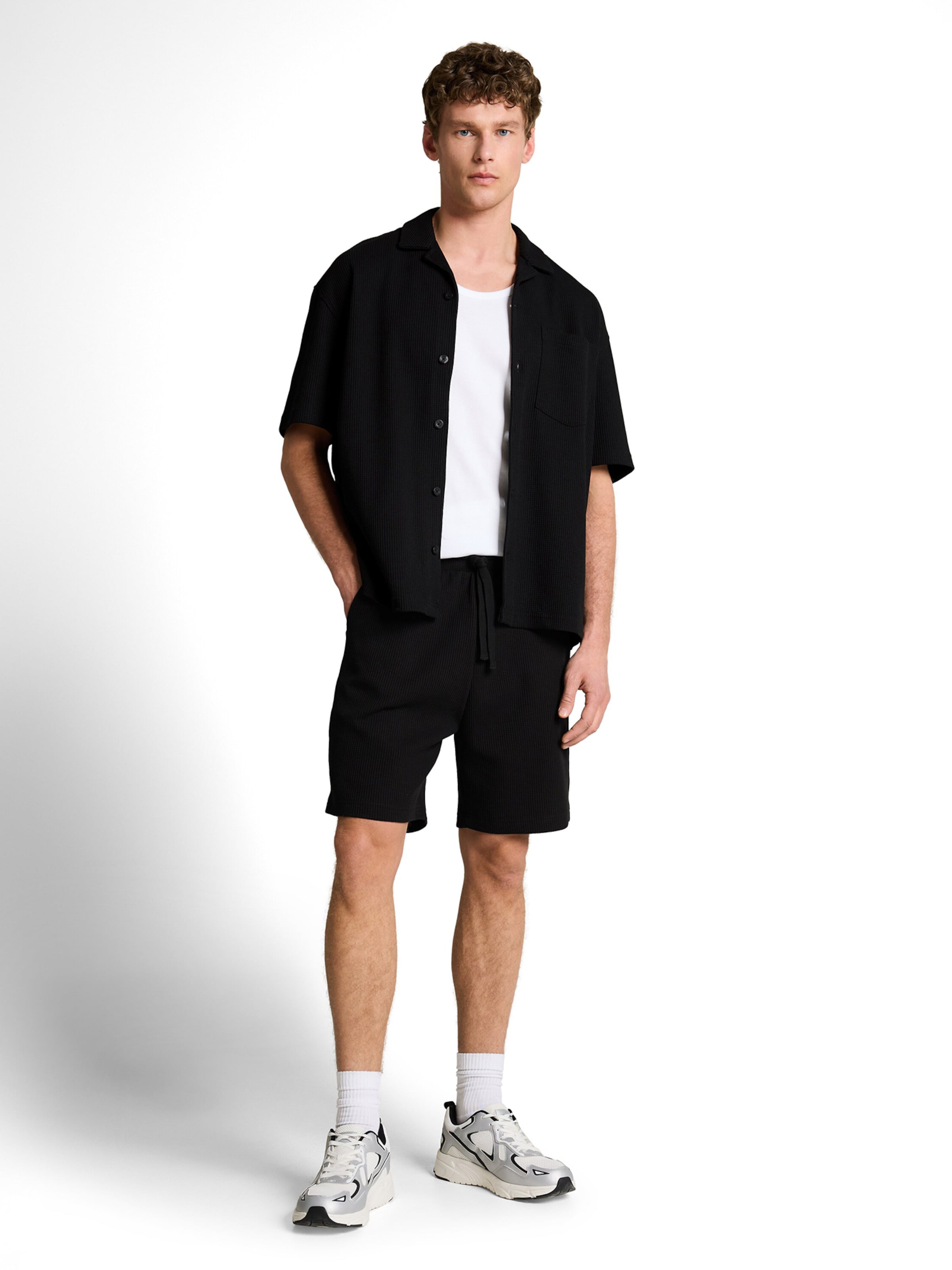 TOM TAILOR DENIM - regular Pantalón en negro: frente