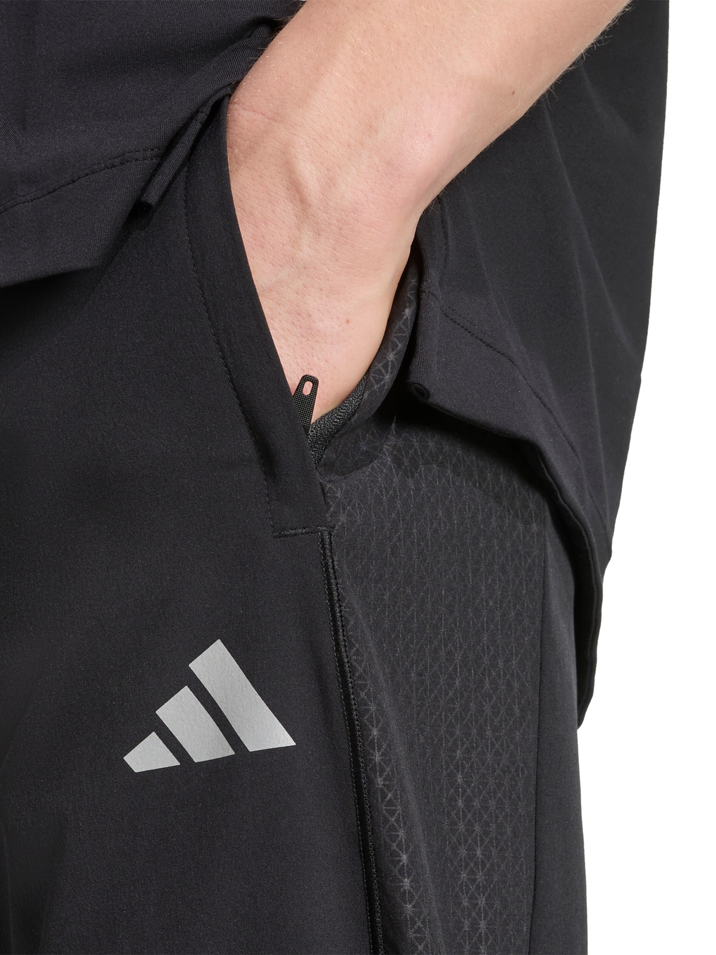 Tapered Pantaloni sportivi 'Tech Apparel' di ADIDAS PERFORMANCE in nero