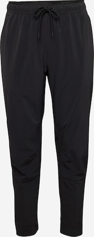 NIKE Tapered Sportsbukser 'Unlimited' i sort: forside