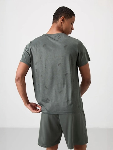 T-Shirt fonctionnel Tommy Life en vert