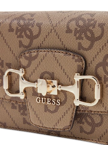 GUESS Umhängetasche 'Janie Logo Cnvrtbl Xbody Flap'‌‌‌‌‌‌‌ in Braun