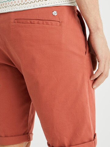 WE Fashion - Slimfit Calças chino em vermelho