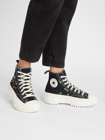 Baskets hautes CONVERSE en noir : devant