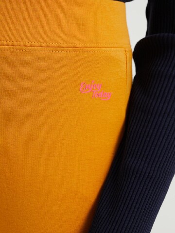 WE Fashion - Skinny Leggings em laranja