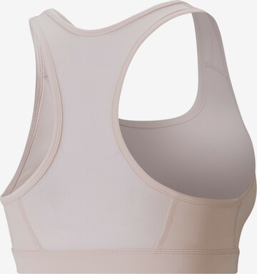 PUMA Bustier Biustonosz sportowy w kolorze różowy