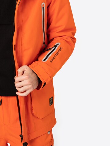 Superdry Snow Jacke in Orange