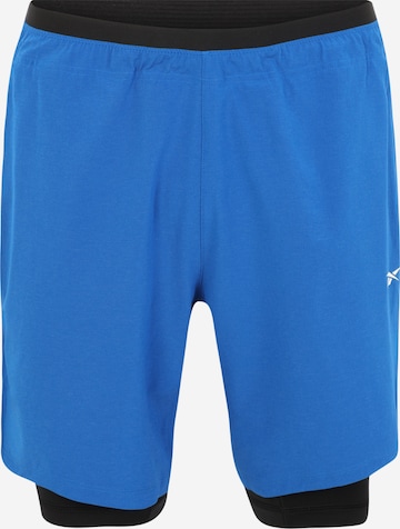 Pantalon de sport Reebok en bleu : devant