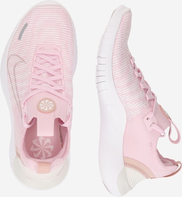 Chaussure de course NIKE en rose