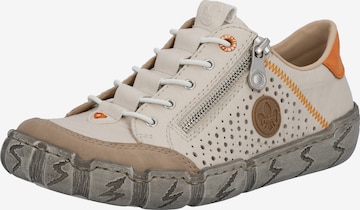 Chaussure de sport à lacets Rieker en beige : devant