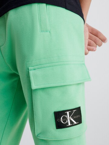Calvin Klein Jeans Tapered Broek in Groen