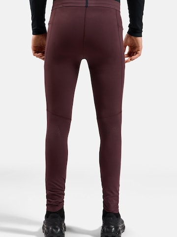 Slimfit Pantaloni sportivi 'ZEROWEIGHT' di ODLO in rosso
