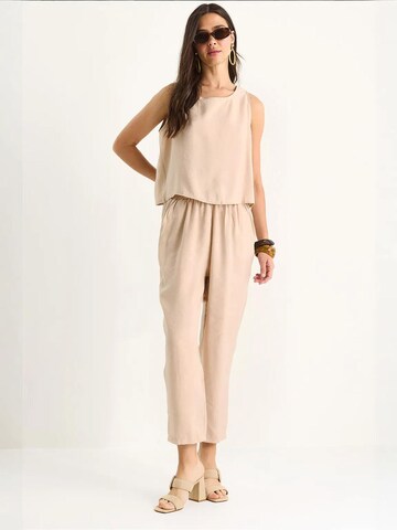 Bianco Lucci Pantsuit in Beige: front
