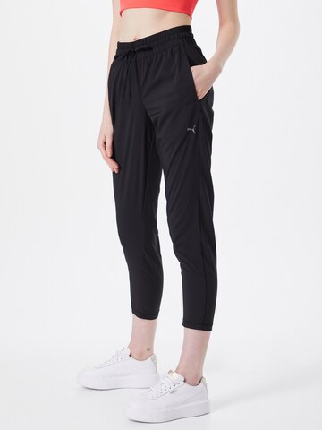 PUMA Loose fit Workout Pants 'Studio' in Black: front