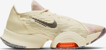 Chaussure de sport NIKE en beige