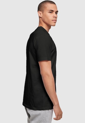 T-Shirt 'Caution Hot' Merchcode en noir