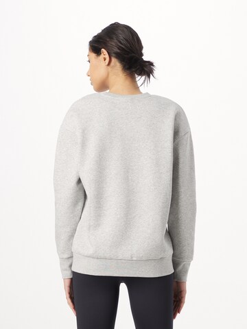 Sweat de sport 'Essential' UNDER ARMOUR en gris