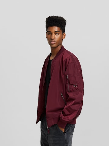 Veste mi-saison Bershka en rouge : devant