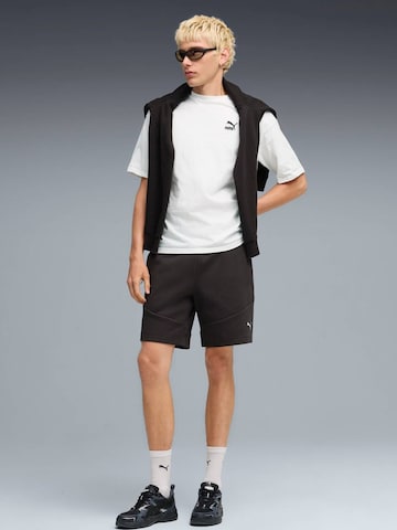 PUMA - regular Pantalón deportivo 'Puma Evostripe Shorts Dk' en negro: frente