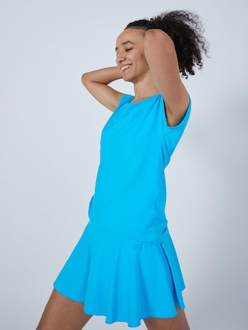 SPORTKIND - Camiseta funcional 'Loose Fit' en azul