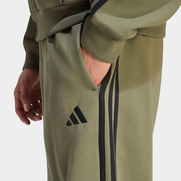 ADIDAS SPORTSWEAR Tapered Workout Pants in Green
