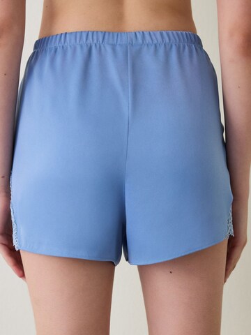 Pantalon de pyjama 'PENTI Luna Spitzen-Satinhose' Penti en bleu