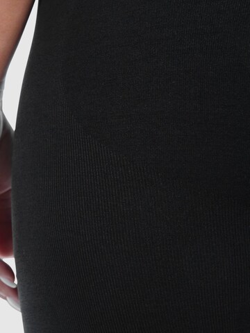 Coupe slim Leggings Smilodox en noir