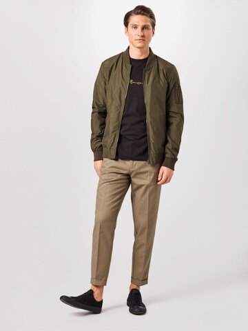 BURTON MENSWEAR LONDON - Tapered Calças com vincos em verde