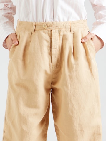 Wide leg Pantaloni con pieghe di TOMMY HILFIGER in beige