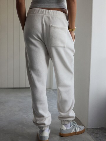 self. Tapered Pants in Beige