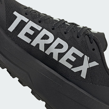 Chaussure de course 'Agravic Sl' ADIDAS TERREX en noir