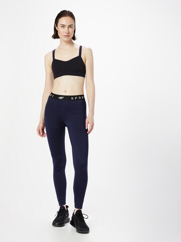 Skinny Pantaloni sportivi di 4F in blu