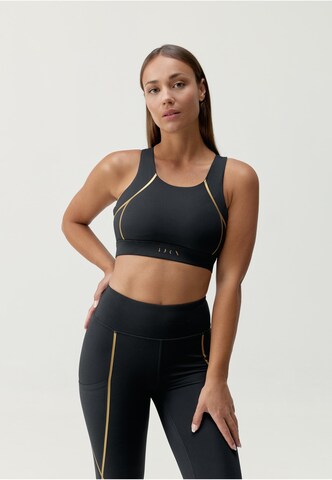 Bustier Soutien-gorge 'Gold' Born Living Yoga en noir : devant