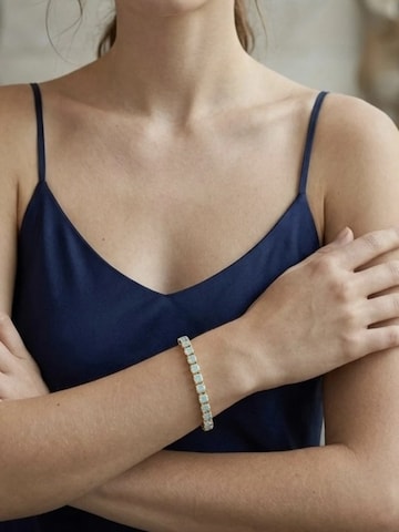 Bracelet 'Gold Line bracelet with Sw crystals in white opal' Gloria Mago en or
