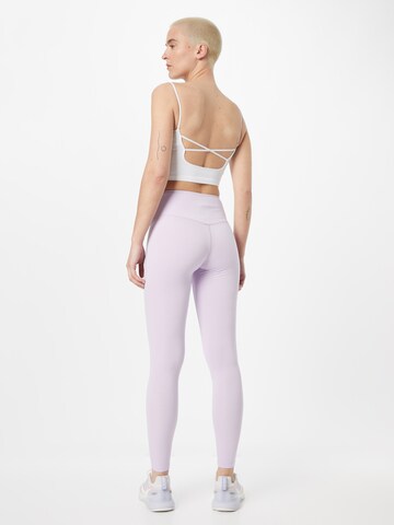 Girlfriend Collective Skinny Spodnie sportowe 'FLOAT' w kolorze fioletowy