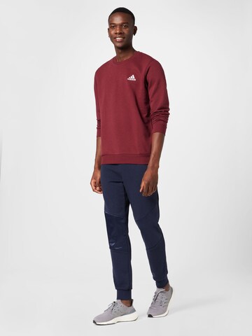 ADIDAS SPORTSWEAR Urheilullinen collegepaita 'Essentials' värissä punainen