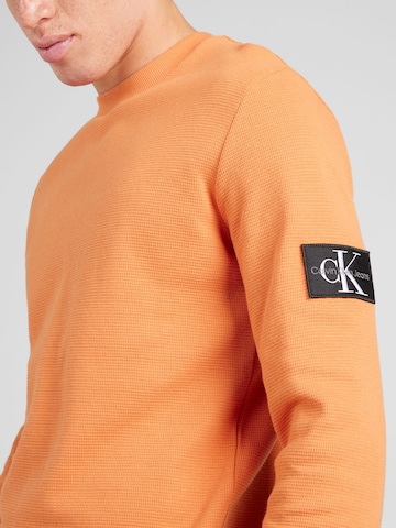 oranžinė Calvin Klein Jeans Marškinėliai