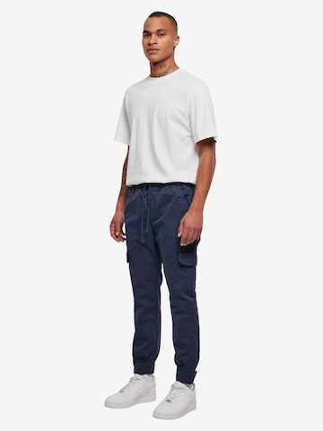 Urban Classics Tapered Gargohousut värissä sininen