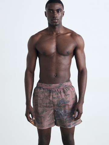 DIESEL Plavecké šortky 'RIO' – šedá: přední strana