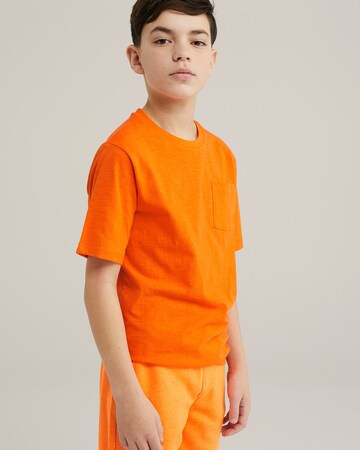 T-Shirt WE Fashion en orange : devant