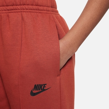 Nike Sportswear Tapered Pants in Red