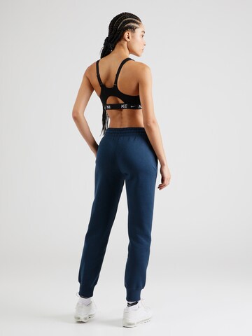 Effilé Pantalon de sport 'Phoenix Fleece' Nike Sportswear en bleu