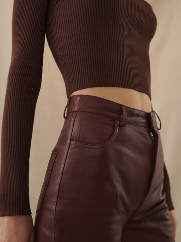 Kendall for ABOUT YOU Boot cut Trousers 'Dita' in Brown