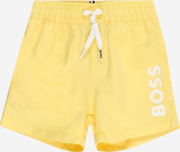 BOSS Kidswear Шорти за плуване в жълто: отпред