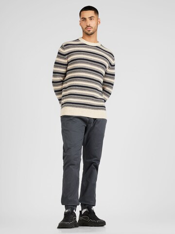Tommy Jeans Tapered Hose 'SCANTON' in Grau