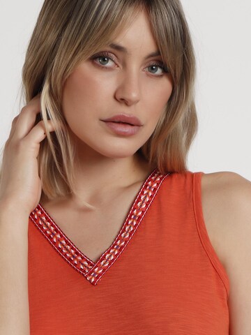 admas - Top en rojo