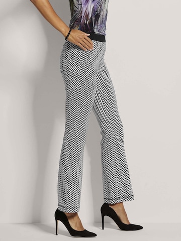 MADELEINE Flared Broek in Zwart