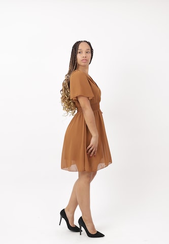 Elara Cocktailjurk in Bruin